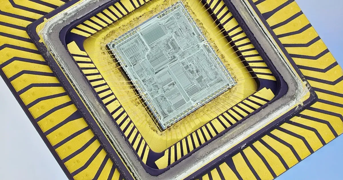 A silicon chip die photographed through a microscope
